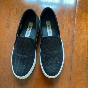 Black Steve Madden slip ons